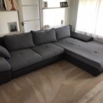 This is a photo of a grey L shape sofa that has been professionally steam cleaned, also the beige carpets have been steam cleaned too works carried out by Borehamwood Carpet Cleaning