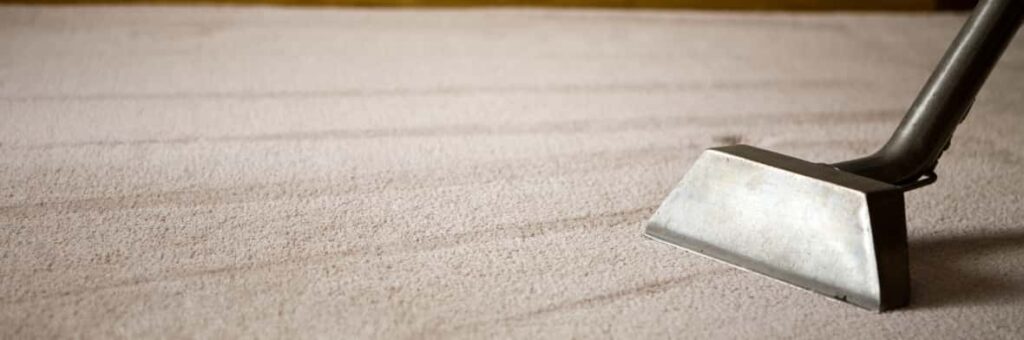 This is a photo of a carpet steam cleaner cleaning a cream carpet works carried out by Borehamwood Carpet Cleaning