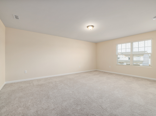 This is a photo of an empty room with cream carpets works carried out by Borehamwood Carpet Cleaning